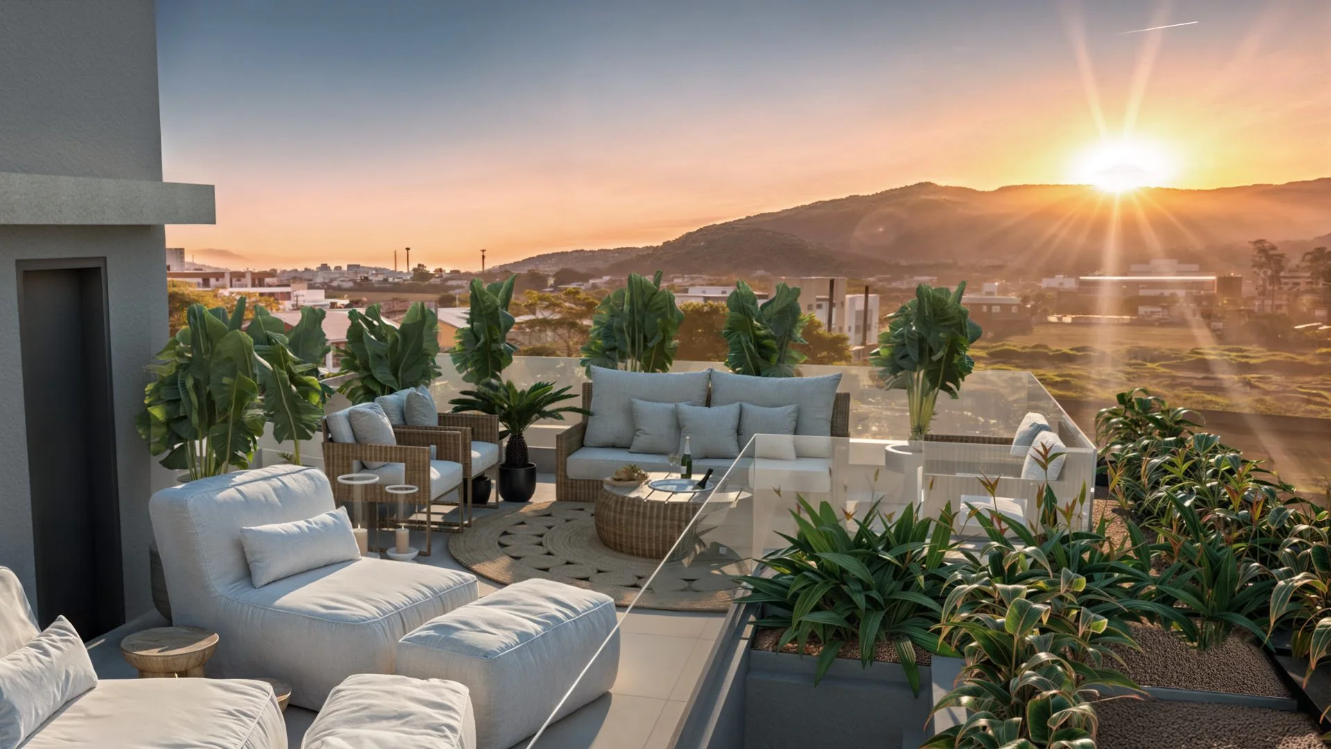 Rooftop privativo mobiliado ao fim da tarde, com jardineiras e vista para os morros
